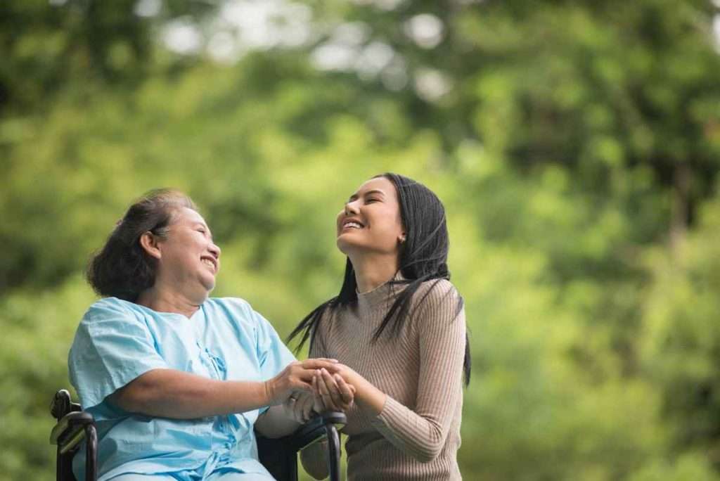 Caregiver and senior enjoying a peaceful moment together.