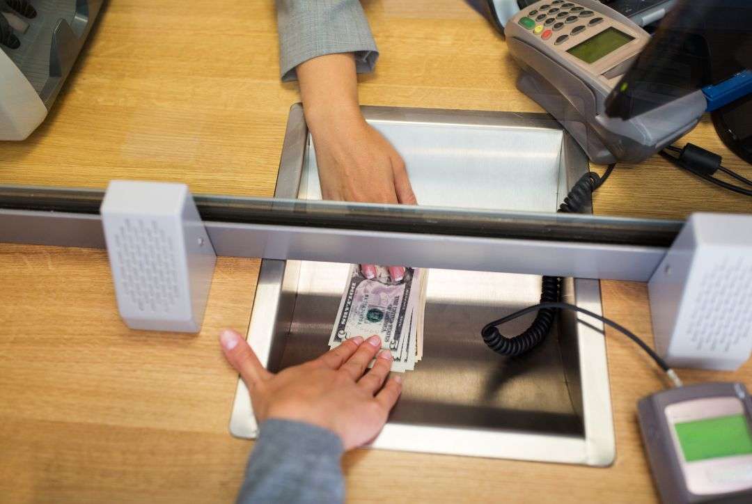 Customer making a cash payment for home care or healthcare services.